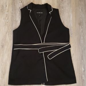 Black and white wrap vest